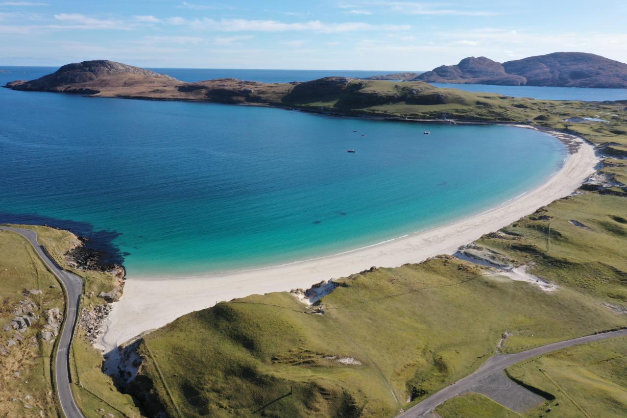 A remote beach and blue sea on a clear day